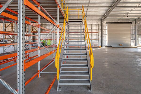 Mezzanine Floor access staircase in a new warehouse.