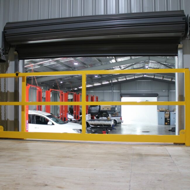 Sliding Access Gate In Use On A Mezzanine Floor At A Automotive Service Centre